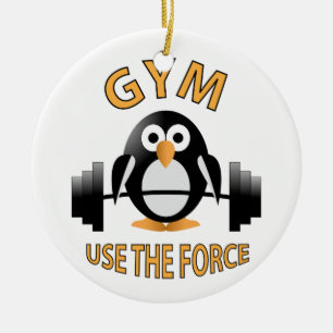 Penguin with a barbell ceramic tree decoration