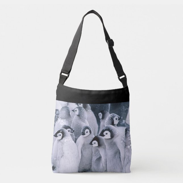 Penguins in snow crossbody bag (Front)