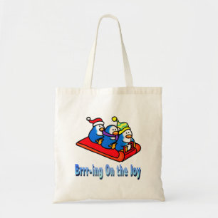 Penguins Sledding Winter Holiday Scene Tote Bag
