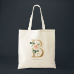 Peony Floral Letter B Gold Monogram Bridesmaid Tote Bag<br><div class="desc">Floral letter B monogram tote bag features watercolor floral bouquet of white and blush pink peonies and roses, greenery accent and faux gold foil letter. This letter B floral bridesmaid monogram tote bag is perfect for weddings, showers, birthdays and so much more. Personalize by adding names or a short phrase....</div>