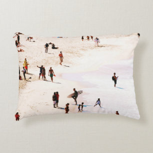 People on beach in the morning decorative cushion