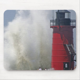 People on jetty watch large breaking waves in mouse pad