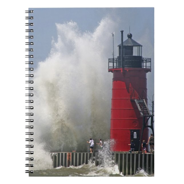 People on jetty watch large breaking waves in spiral notebook (Front)