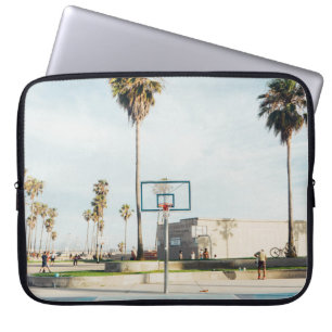 People outside outdoor basketball court laptop sleeve