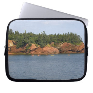 People sea kayaking in the Bay of Fundy at St. Laptop Sleeve