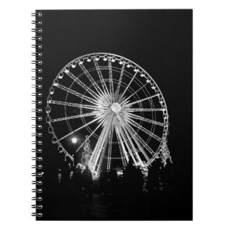 PEOPLE STANDING NEAR FERRIS WHEEL NOTEBOOK
