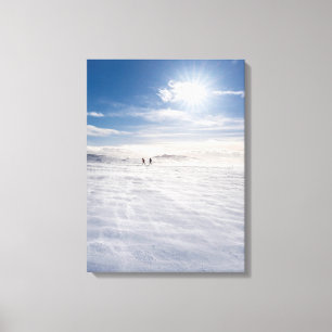 People walking over snow, Iceland Canvas Print
