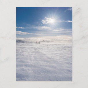 People walking over snow, Iceland Postcard