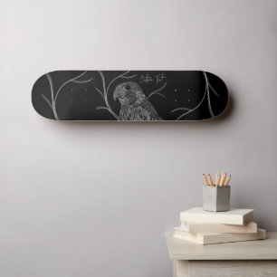 Peregrine Falcon in Tree Branches with Handwriting Skateboard