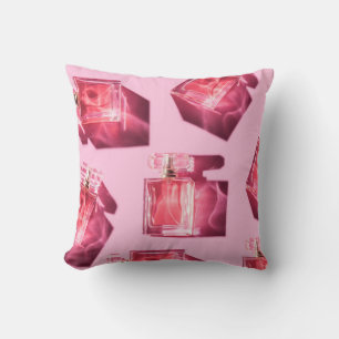 Perfume bottles, pink background, flatlay cushion