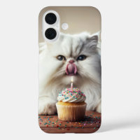 Persian Cat Licking a Birthday Cupcake