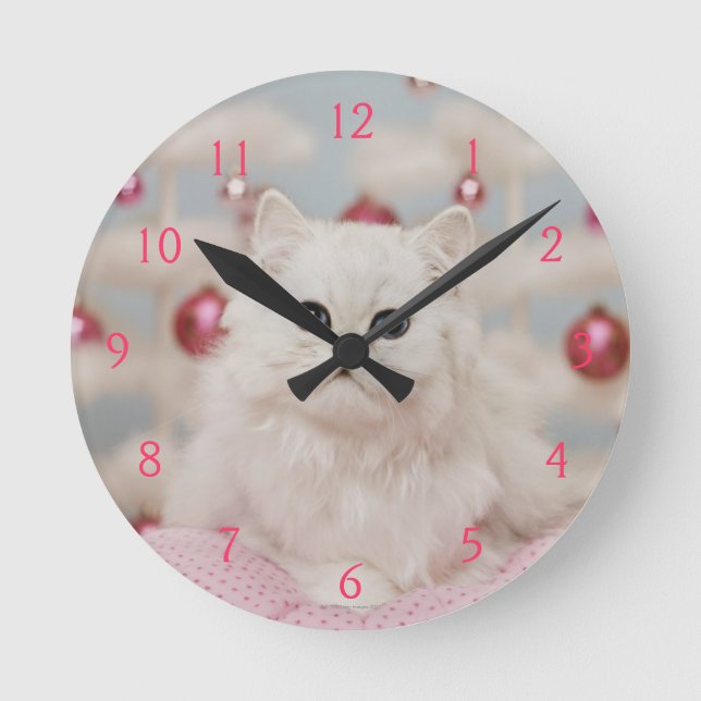 Persian cat sitting on pink pillow round clock (Front)