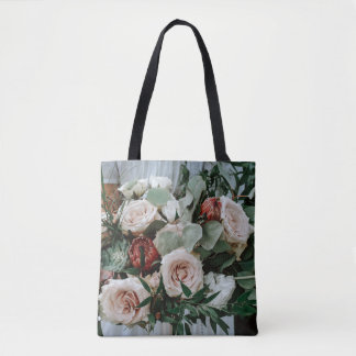 PERSON HOLDING BOUQUET OF PINK AND RED FLOWERS TOTE BAG