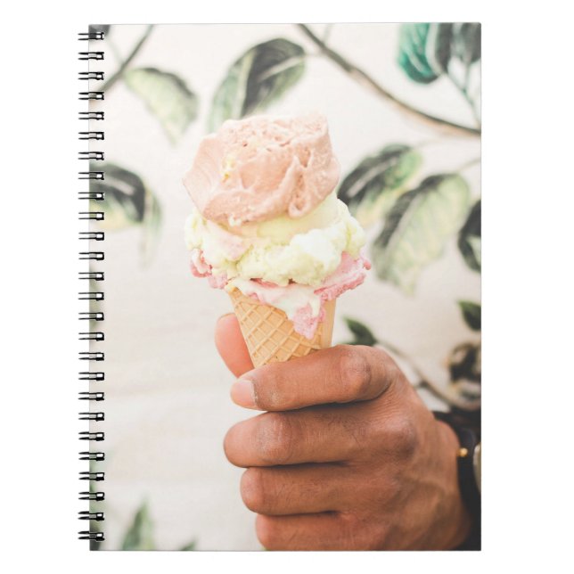 Person holding ice cream cone with three flavours  notebook (Front)