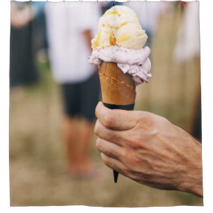 Person holding ice cream on cone shower curtain