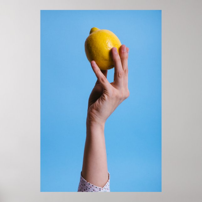 Person holding lemon poster (Front)