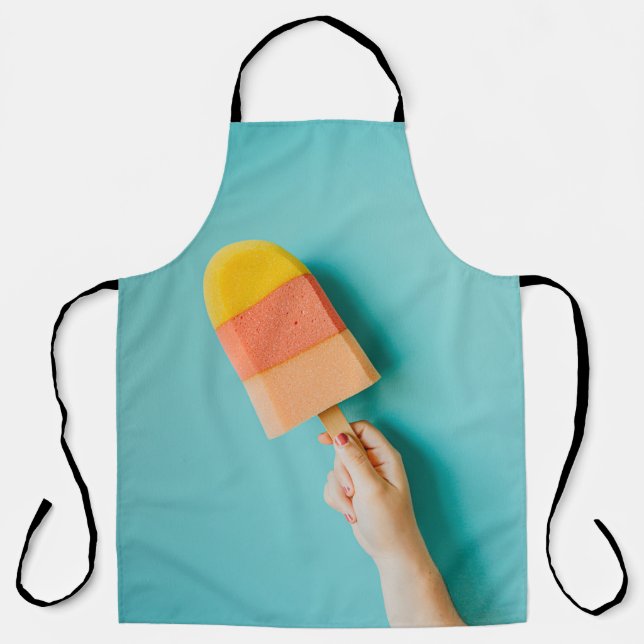 Person holding yellow and pink popsicle apron (Front)