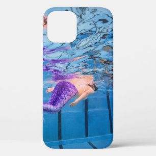 Person in purple pants lying on blue hammock iPhone 12 case