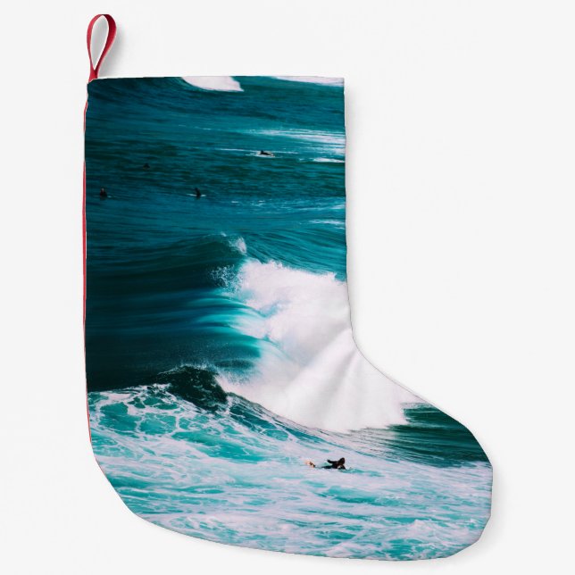 Person on surfboard with ocean waves small christmas stocking (Front)