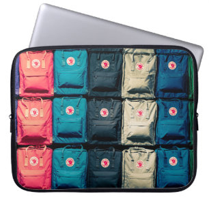 Person showing assorted-colour bags