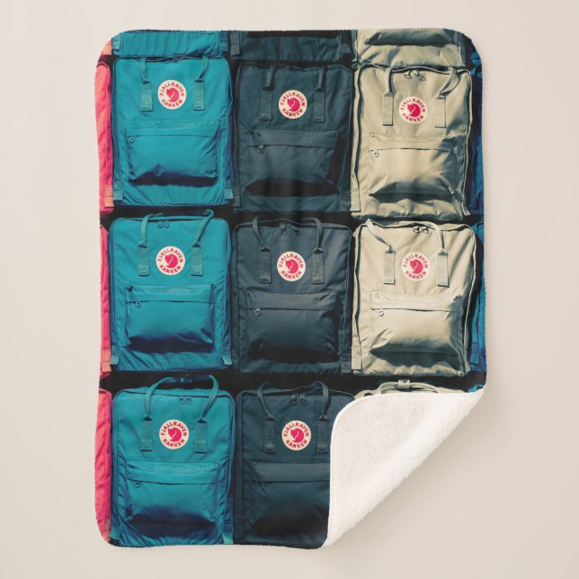 Person showing assorted-colour bags sherpa blanket (Front)