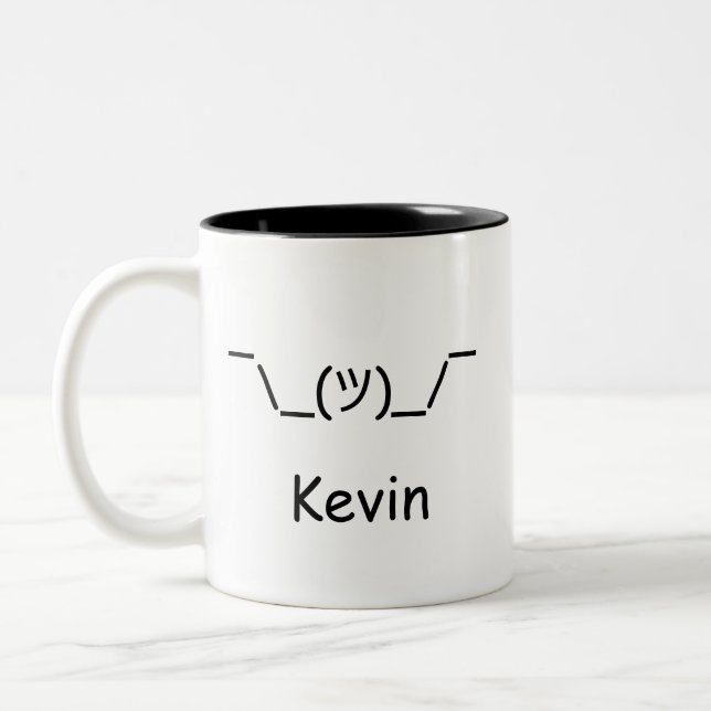 Person Shrugging Shruggie Two-Tone Coffee Mug (Left)
