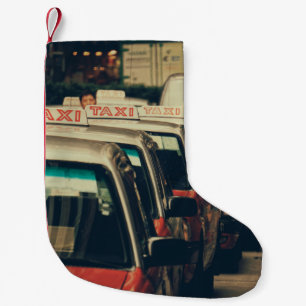 PERSON STANDING NEAR PARKED TAXI DURING DAYTIME SMALL CHRISTMAS STOCKING