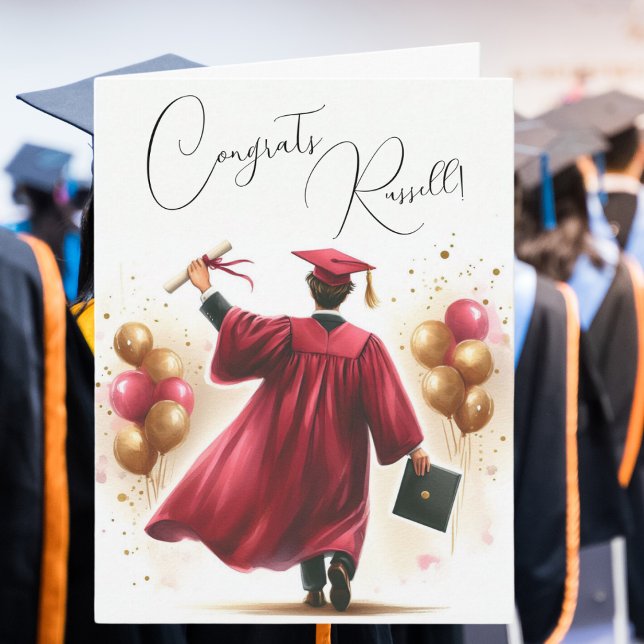 Personalise Happy Graduation Man Crimson Cap Gown Card (Celebrate with this fun crimson graduation cap and gown!)