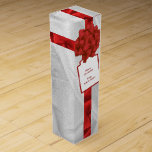 Personalise: "Merry Christmas" Red Textured Wine Box<br><div class="desc">Give a gift of wine this holiday season with this very impressive gift box with printed ribbon, bow and gift tag. Personalise it with names and occasion with the easy text template. It could also show initials, monograms, quotes for any occasion. The design is digital art created to look like...</div>