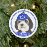 Personalised Bernedoodle Hanukkah Yarmulke Blue Ceramic Tree Decoration<br><div class="desc">Celebrate your favourite mensch on a bench with personalised ornament! This design features a sweet illustration of a bernedoodle or sheepadoodle dog with a blue and white yarmulke. For the most thoughtful gifts, pair it with another item from my collection! To see more work and learn about this artist, visit...</div>