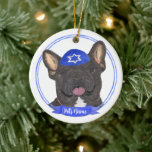 Personalised Black Brindle Frenchie Hanukkah Ceramic Tree Decoration<br><div class="desc">Celebrate your favourite mensch on a bench with a personalised ornament! This design features a sweet illustration of a black or brindle french bulldog dog with a blue and white yarmulke. For the most thoughtful gifts, pair it with another item from my collection! To see more work and learn about...</div>