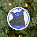 Personalised Black Cat Hanukkah Yarmulke Blue Ceramic Tree Decoration<br><div class="desc">Celebrate your favourite mensch on a bench with personalised ornament! This design features a sweet illustration of a black cat with a blue and white yarmulke. For the most thoughtful gifts, pair it with another item from my collection! To see more work and learn about this artist, visit her at...</div>