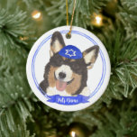 Personalised Black Headed Tricolor Corgi Hanukkah Ceramic Tree Decoration<br><div class="desc">Celebrate your favourite mensch on a bench with personalised ornament! This design features a sweet illustration of a black headed tricolor corgi dog with a blue and white yarmulke. For the most thoughtful gifts, pair it with another item from my collection! To see more work and learn about this artist,...</div>