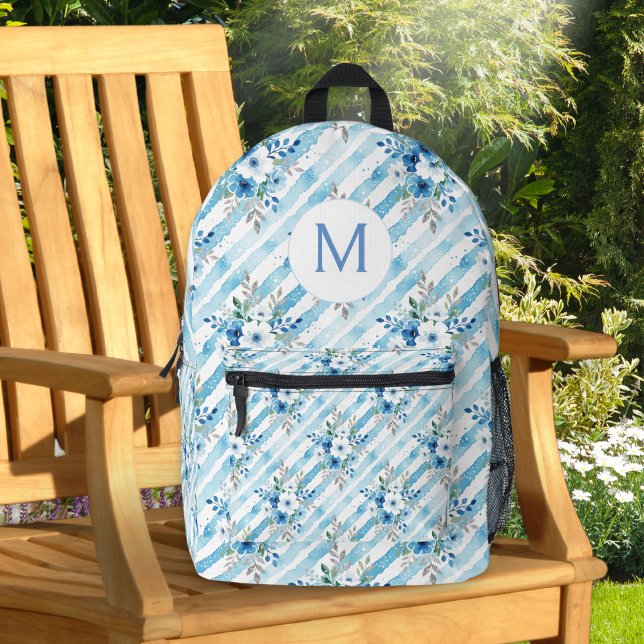 Personalised Blue Floral Travel Aesthetic Printed Backpack (A monogrammed backpack in fresh blue, white and sage green, with floral striped pattern)