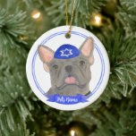 Personalised Blue Grey Frenchie Hanukkah Ceramic Tree Decoration<br><div class="desc">Celebrate your favourite mensch on a bench with personalised ornament! This design features a sweet illustration of a blue grey french bulldog or frenchie dog with a blue and white yarmulke. For the most thoughtful gifts, pair it with another item from my collection! To see more work and learn about...</div>