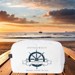 Personalised Boat Captain Vintage Nautical Wheel Dopp Kit<br><div class="desc">Chic custom boat captain cosmetic bag for an ocean liner company featuring a navy blue boat steering wheel. This vintage nautical themed design is perfect for a ship helmsman near the beach. Personalise with your name.</div>