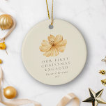 Personalised Boho Floral First Christmas Engaged Ceramic Tree Decoration<br><div class="desc">Celebrate the joy of your first Christmas engaged with this stunning boho-inspired ceramic ornament. Featuring a soft yellow watercolor floral design, this ornament is personalised with your names and the year, creating a beautiful keepsake to mark this special milestone. The delicate flower and warm tones add a touch of bohemian...</div>