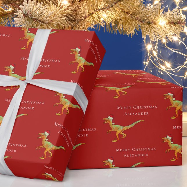 Personalised Boy Name Christmas Dinosaur Raptor Wrapping Paper (Merry Christmas dinosaur personalized name fun velociraptor dino in santa hat festive red gift wrap)