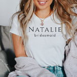 Personalised Bridesmaid Gift Wedding Bridal Party T-Shirt<br><div class="desc">Our Personalised Bridesmaid Gift Wedding Bridal Party T-Shirts are a stylish and thoughtful way to express your gratitude to your bridal party. These shirts can be personalised with the names or roles of your bridal party members, making them a special keepsake to remember your wedding day. These minimalist and elegant...</div>