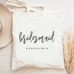 Personalised Bridesmaid Handwriting Script Tote Bag<br><div class="desc">This simple,  elegant tote bag features the word "bridesmaid" in charcoal grey handwriting script. Personalise it with her name in sans serif font. Makes a perfect bridesmaid gift!</div>