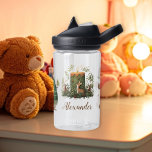 Personalised Christmas Whimsical Baby 1st Christma Water Bottle<br><div class="desc">Celebrate your baby’s first Christmas with the Personalised Christmas Whimsical Baby 1st Christmas Water Bottle. This isn’t just any water bottle; it’s a personalised keepsake that commemorates this special milestone in your baby’s life. Customise it with your baby’s name to create a unique and meaningful addition to your holiday gear....</div>