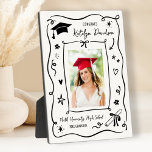 Personalised Doodle Photo Congrats Grad Plaque<br><div class="desc">A charming graduation plaque featuring a senior photo surrounded by a whimsical hand-drawn doodle border with a graduation cap, stars, and confetti on a clean white background. The Congrats headline leads into the graduate's name in script with the school name and class year below. A playful tabletop keepsake for displaying...</div>