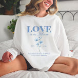 Personalised Dusty Blue Wildflower Bridal Shower Sweatshirt<br><div class="desc">Our Personalised Dusty Blue Wildflower Bridal Shower Crewneck Sweatshirt, designed especially for her bridal party! These sweatshirts are the perfect addition to your bridal shower ensemble, featuring a charming vintage botanical print of wildflowers in a serene dusty blue hue. Ideal for a spring or summer wedding, these sweatshirts capture the...</div>