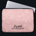 Personalised Elegant Pink Glitter Laptop Sleeve<br><div class="desc">This personalised girly laptop sleeve has your name in black text on a beautiful pink glitter background. Customise the laptop case with the name of your choice to make someone feel extra special. Makes a fun gift for birthdays or for Christmas, and perfect for back to school. Designed for you...</div>