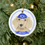 Personalised English Cream Dachshund Dog Hanukkah Ceramic Tree Decoration<br><div class="desc">Celebrate your favourite mensch on a bench with personalised ornament! This design features a sweet illustration of a fawn, tan, or cream english long haired dachshund dog with a blue and white yarmulke. For the most thoughtful gifts, pair it with another item from my collection! To see more work and...</div>