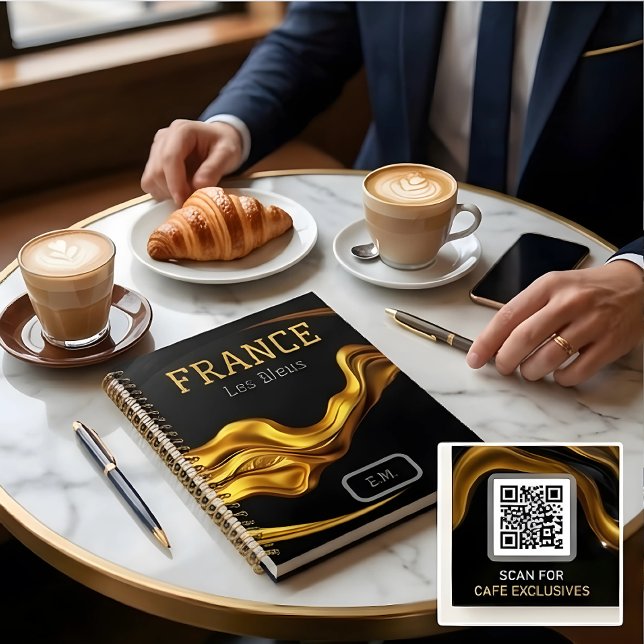 Personalised Executive Opulent: Achempon 2026 Gold Planner (2026 Global Elite black and gold notebook at a luxury café setting. Fully customizable on Zazzle. ☕✨)