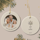 Personalised Family Photo Snowflake Ornament<br><div class="desc">Create heartwarming memories this holiday season with our "Personalised Family Photo Snowflake Ornament." The front of this exquisite ornament showcases your family name against a light background, symbolising unity and love. What makes this ornament truly special is the family photo framed by a champagne gold snowflake on the left, capturing...</div>