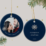 Personalised First Christmas Ornament<br><div class="desc">Celebrate a special milestone with this Personalised First Christmas ornament. Cherish your first holiday together as a couple with this exquisite ornament featuring a customisable photo framed by a delicate snowflake on a rich navy blue background. The front elegantly displays 'Our First Christmas' in the lower thirds, capturing the magic...</div>
