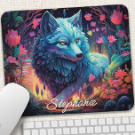 Personalised Floral Mystical Wolf Mouse Pad<br><div class="desc">Transform your workspace into a mystical haven with this personalised mouse pad featuring a majestic wolf howling amidst an enchanted forest. The captivating scene, illuminated by the moon's ethereal glow, evokes a sense of wonder and adventure. Add a personal touch with your name or a meaningful quote. The smooth surface...</div>