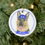 Personalised German Shepherd Dog Hanukkah Ceramic Tree Decoration<br><div class="desc">Celebrate your favourite mensch on a bench with a personalised ornament! This design features a sweet illustration of a german shepherd dog with a blue and white yarmulke. For the most thoughtful gifts, pair it with another item from my collection! To see more work and learn about this artist, visit...</div>
